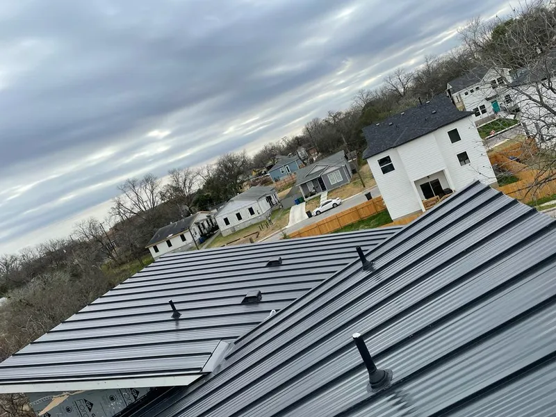 Standing seam metal roof panels with vents for Skylight Repair in Loveland